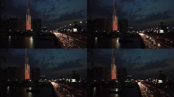 黄昏时，西贡河上的西贡桥和地标81塔的景色