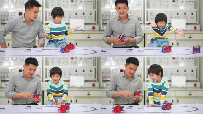 亚洲学生和老师在实验室中测试在路线上运行的机器人机器人汽车，并带有传感器响应。建筑师设计电路和会议共