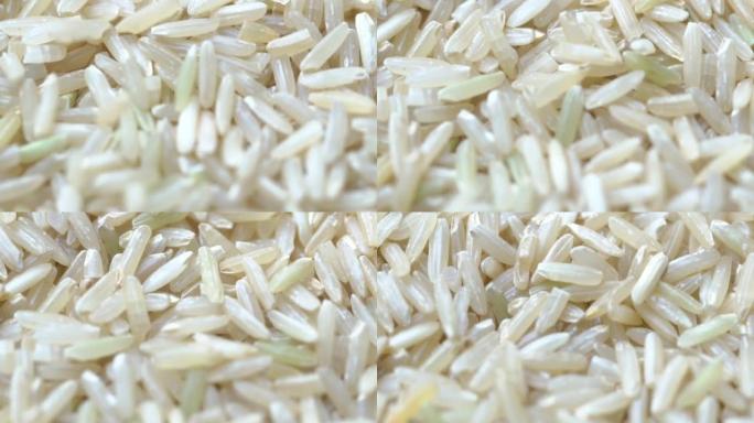 特写茉莉白米，有机天然食品概念的未煮熟产品，顶视图，慢动作镜头