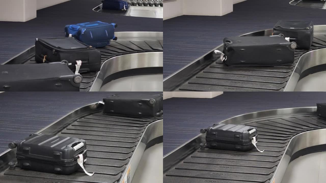 在机场行李认领区的旋转木马上移动的旅行袋热