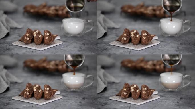 巧克力饼干配榛子和一杯咖啡拿铁。