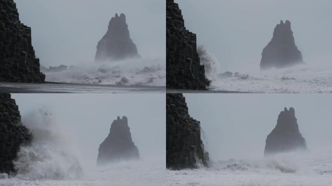 风暴海浪袭击了海堆和黑沙滩