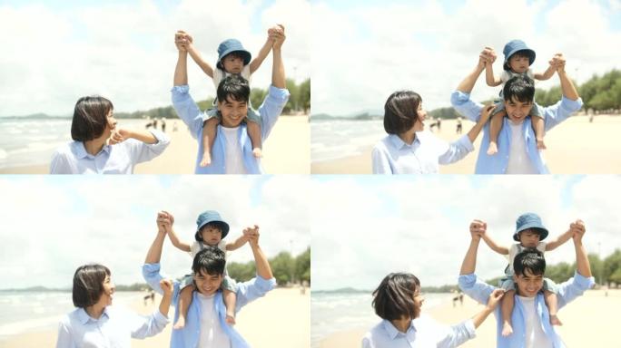 快乐的父母和他们的小孩在夏天在海滩上piggy带的时候玩得开心