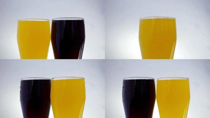 两个完整的玻璃杯，带有汽水特写镜头，在白色背景上旋转。4k原始视频60 fps。