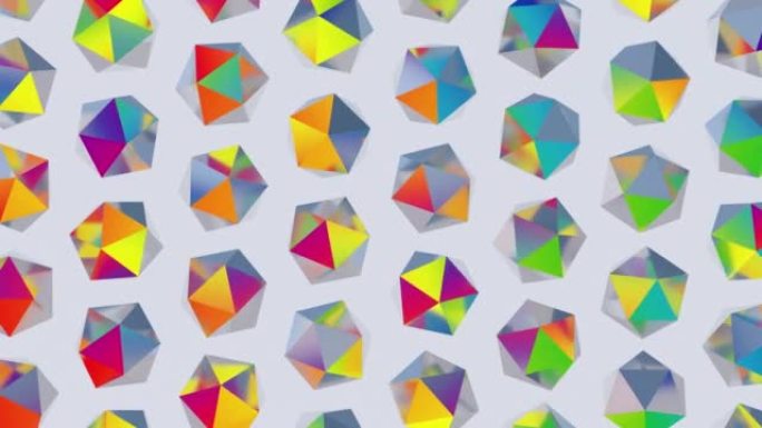 一组明亮多彩的几何形状旋转。彩虹反射。抽象动画，3d渲染。