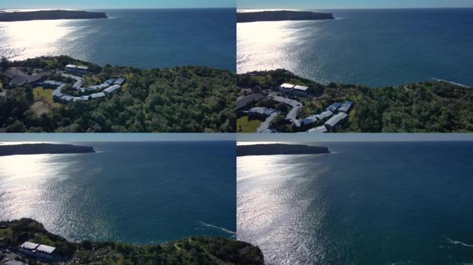 新南威尔士州东悉尼屈臣氏湾的空中无人机视图，朝着海岸线和开阔的海洋