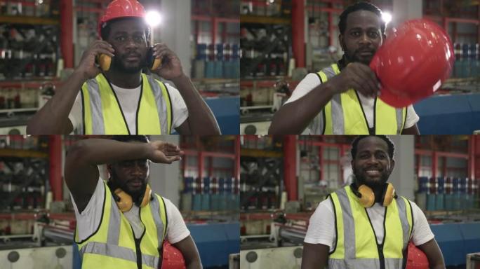 制服站立的工业工厂维修黑色工程肖像脱下头盔，双臂交叉微笑