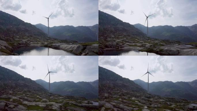 瑞士Gotthard Pass上的风力涡轮机和大坝，无人机
