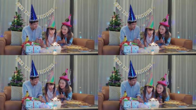 微笑幸福家庭在家庆祝女儿生日