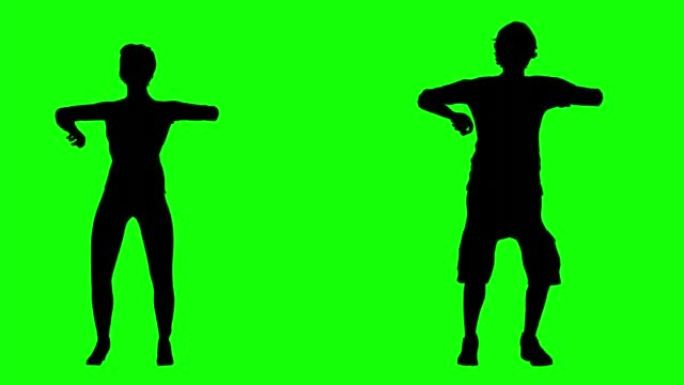 绿色屏幕上的男孩和女孩跳舞剪影