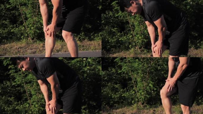 亚洲运动员男性在公园慢跑运动中膝盖疼痛，日落时背景为树木，身体状况膝盖疼痛，关节韧带问题，户外运动膝