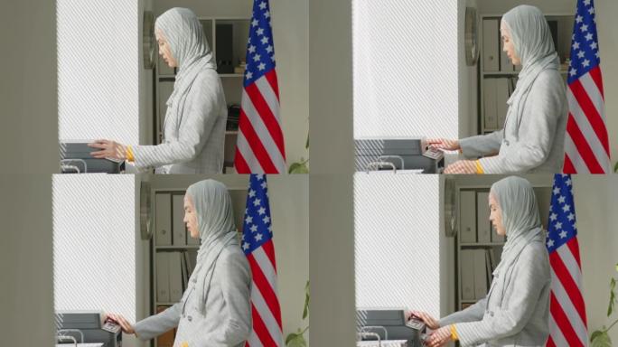 穆斯林妇女在美国大使馆使用打印机