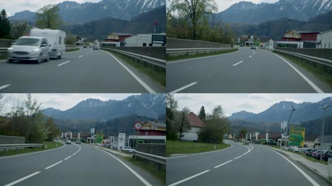 在奥地利春天开车穿过乡村道路