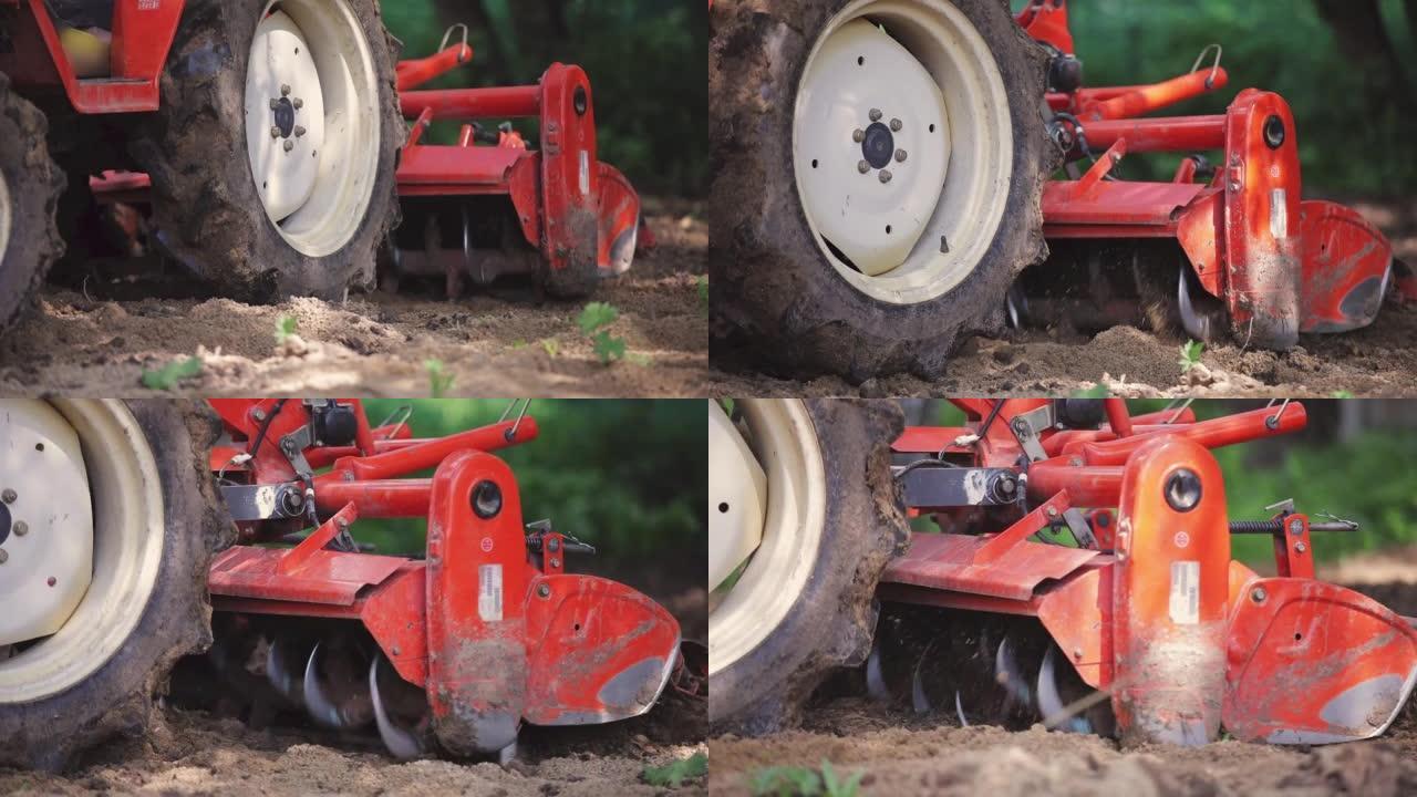 用于松土的微型拖拉机的中耕机。农业工作。挖掘。特写
