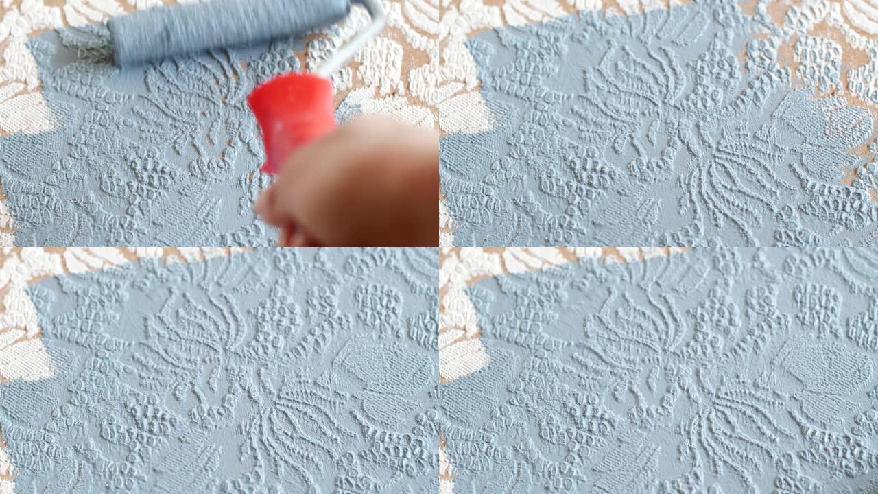 用滚筒刷和蓝灰色染料绘画白色花卉装饰品
