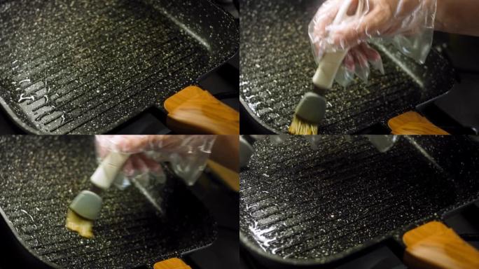 厨师用硅胶刷润滑烤盘