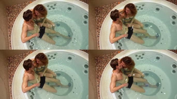 热水浴缸里的年轻夫妇