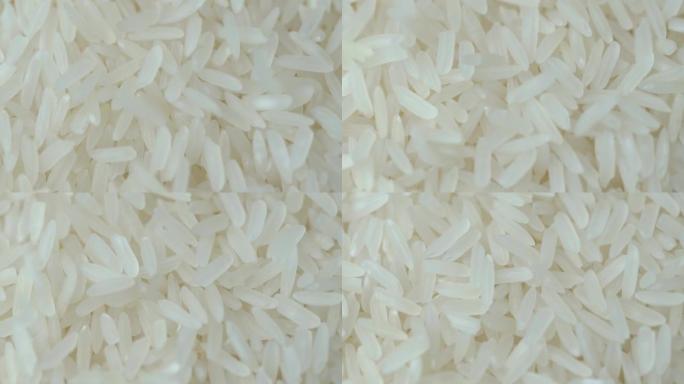 特写茉莉白米，有机天然食品概念的未煮熟产品，顶视图，慢动作镜头
