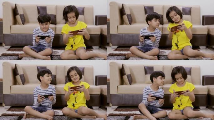 兄弟姐妹在智能手机上玩游戏，姐姐在屏幕上显示