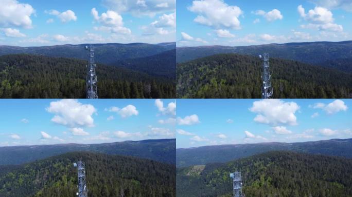 法国4K s é richamp Vosges山区森林中的5g电信天线桅杆塔周围的空中轨道视图