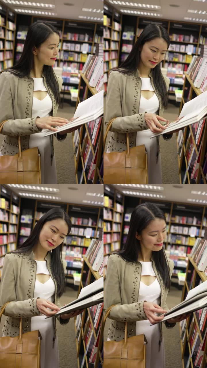 一名年轻女子在书店里浏览一本书
