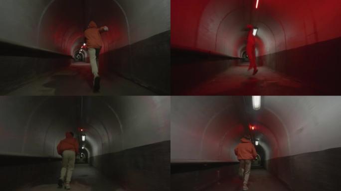 跑酷运动员在混凝土隧道中自由行驶