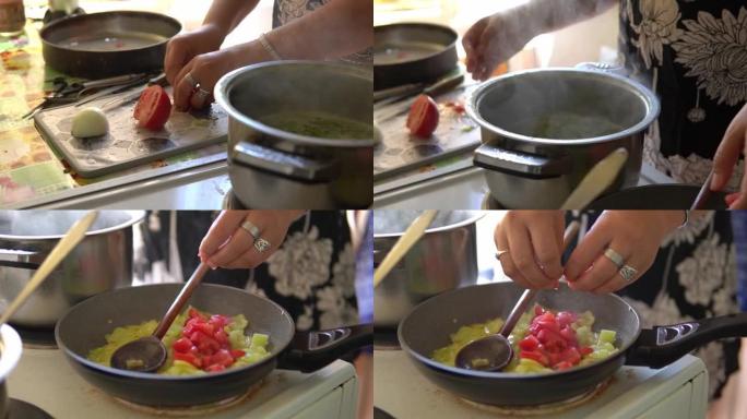 将蔬菜倒入锅中，炸西红柿和辣椒