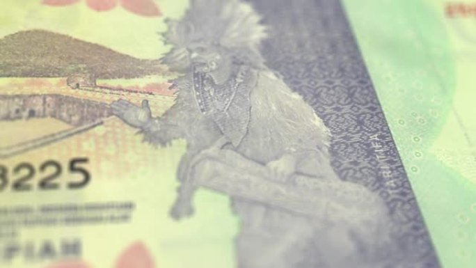 印度尼西亚1000卢比的钞票观察和储备侧特写跟踪多莉拍摄1000印度尼西亚纸币当前1000印度尼西亚