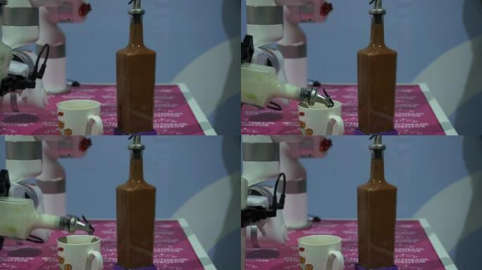 升级机器人的展示。HD r.一种蜘蛛机器人，它像一个真正的机器人一样运行，并且是一台可以举起瓶子和倒