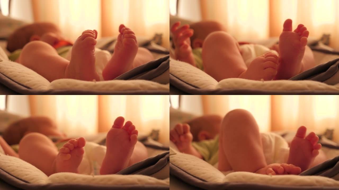 刚出生的婴儿婴儿抽搐摇晃裸露的腿，脚和脚趾近距离躺在家里的床上