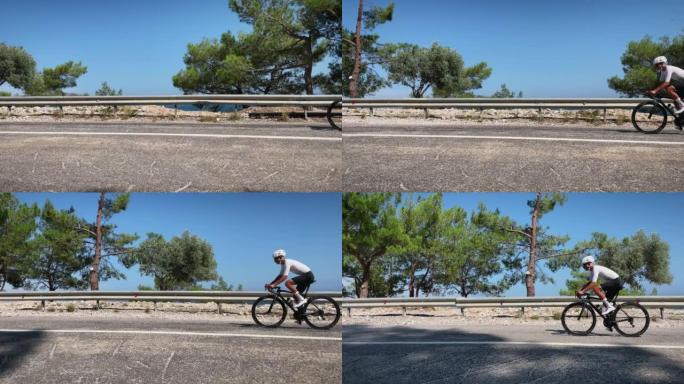 自行车和铁人三项概念。在阳光明媚的炎热天气里，穿着白色头盔、鞋子和骑行服的职业男骑车人骑自行车。男子