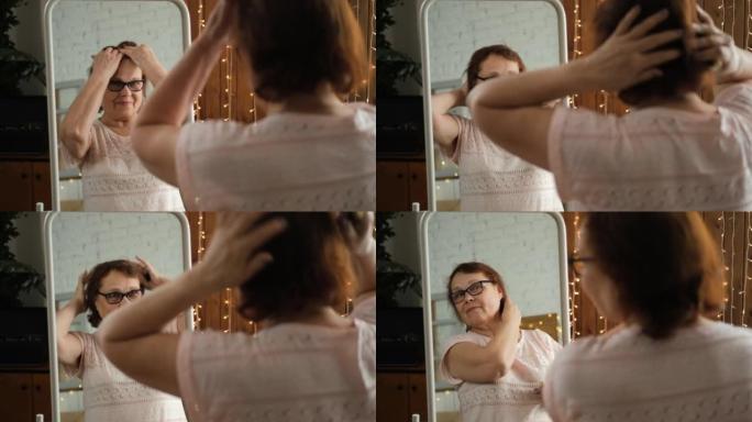 资深女子在镜子前喷香水