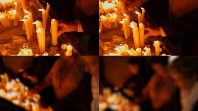 人们在纪念场所点燃蜡烛，悲伤和痛苦。在教堂