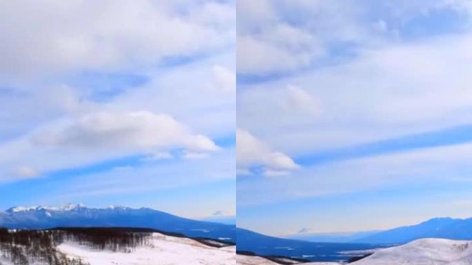 在雪山路上行驶。从乘客座椅看