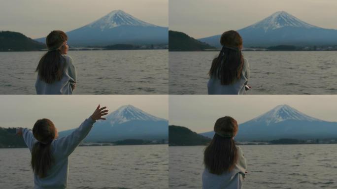 女性放松并享受富士山景观