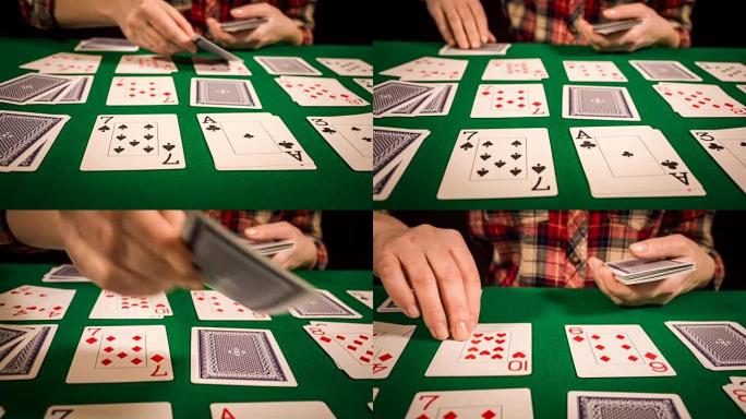 女性手握纸牌和玩纸牌的特写