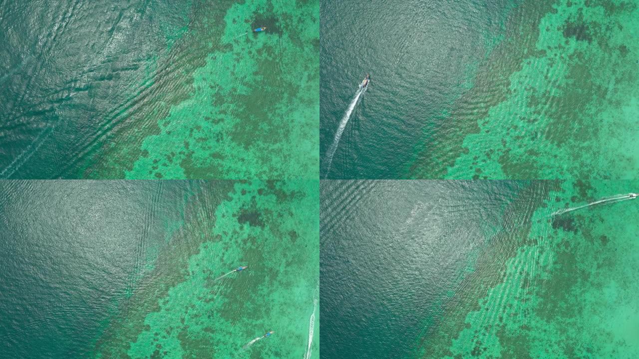 在蓝色绿松石海披披岛上航行的长尾船的空中延时
