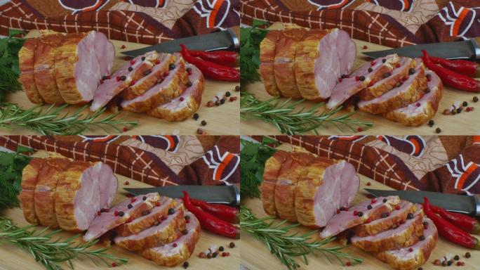 传统火腿用雕刻刀、多色多香果、红辣椒、欧芹、莳萝和罗勒切成薄片。猪肉中的零食概念