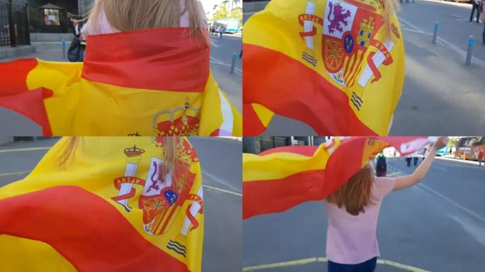 女孩在城市漫步，挥舞着西班牙国旗，庆祝胜利的球迷
