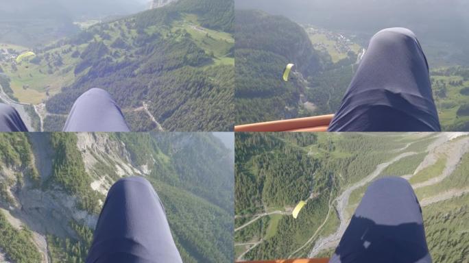 在阿尔卑斯山飞越山脉的滑翔伞的前景