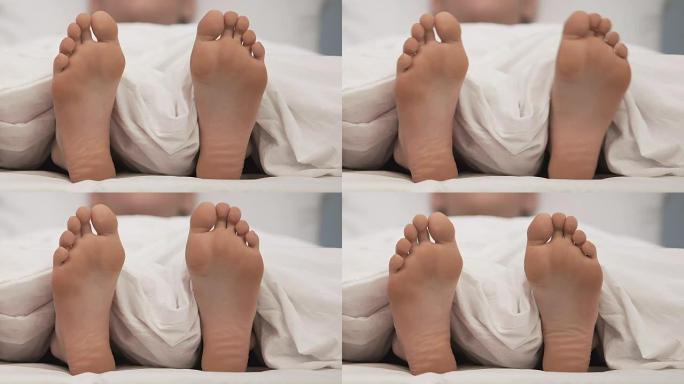 成年男子睡脚近距离移动，健康身体护理，度假生活方式