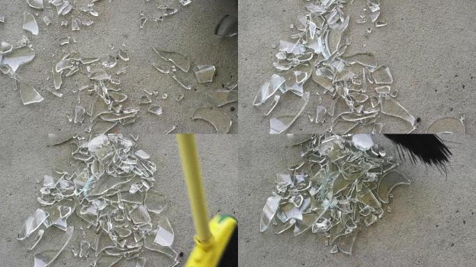 一名妇女用扫帚扫过人行道上的碎玻璃