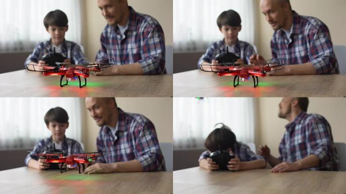 高端科技玩具，小男孩在家操作四轴飞行器，玩得开心