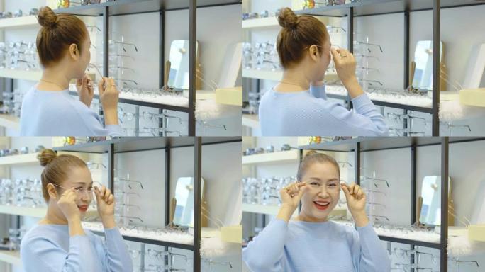 微笑的亚洲高级女性在眼镜店试戴新眼镜。老女戴新眼镜看相机眼镜店眼科门诊选择眼镜概念