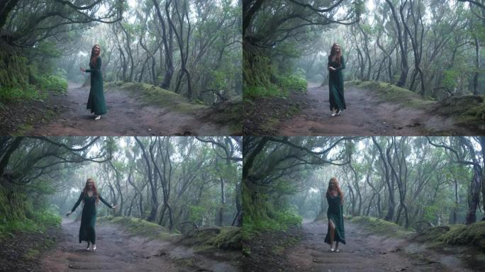 穿着精灵服装的美女正走在神奇的绿色魔法森林里。