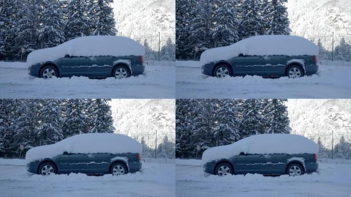 停在山区道路上的积雪覆盖的汽车的静态拍摄