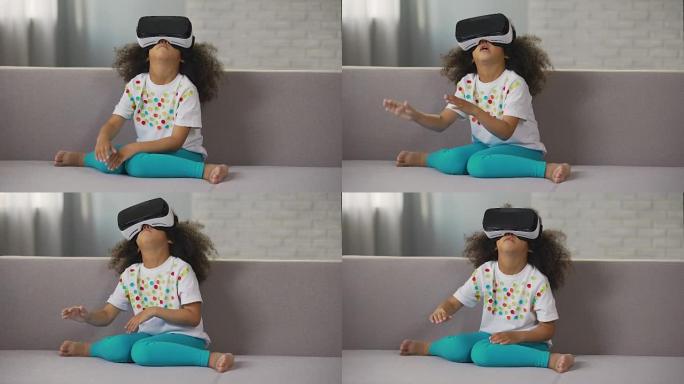 美国黑人女孩戴着虚拟现实耳机玩游戏，休息