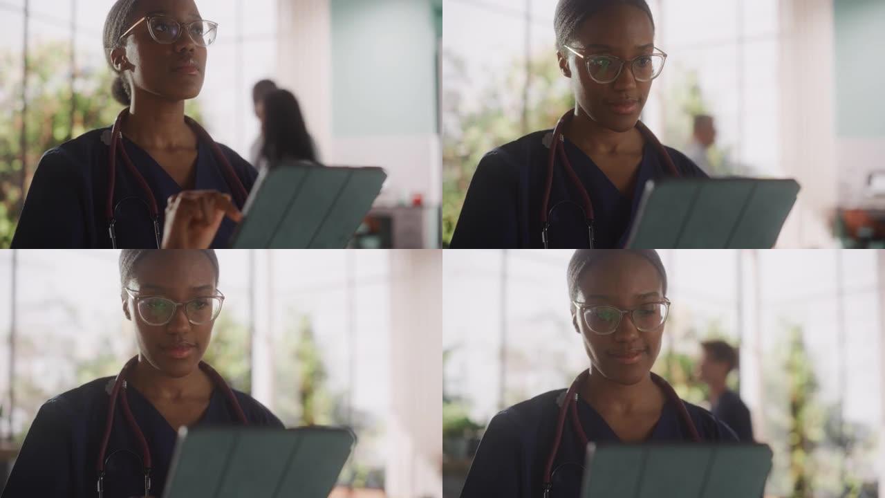 医院办公室在平板电脑上工作的黑人女性医疗保健专业人员的肖像。诊所护士长正在在线指定处方，更新电子健康