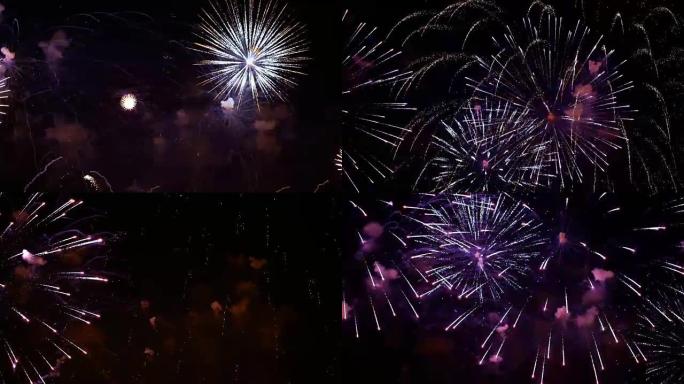 五颜六色的烟花在夜空中爆炸。色彩鲜艳的庆祝活动。