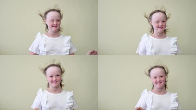 唐氏综合症女孩的特写肖像。国际唐氏综合症日概念